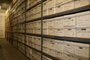 Storage file boxes on shelves
